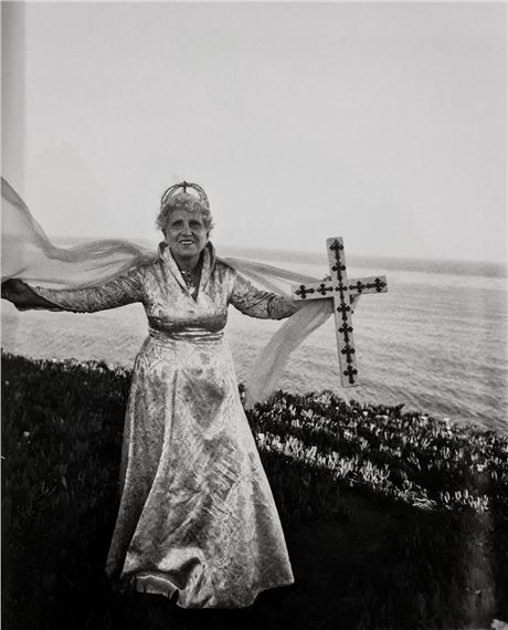LADY WITH CROSS by Diane Arbus, March 14