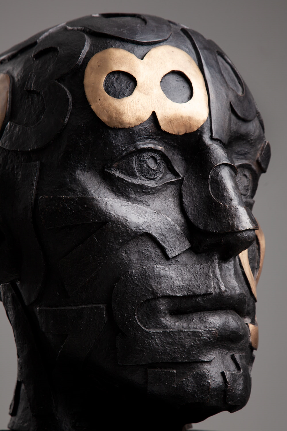 Artwork by Marek Zyga, Big Head, Made of bronze