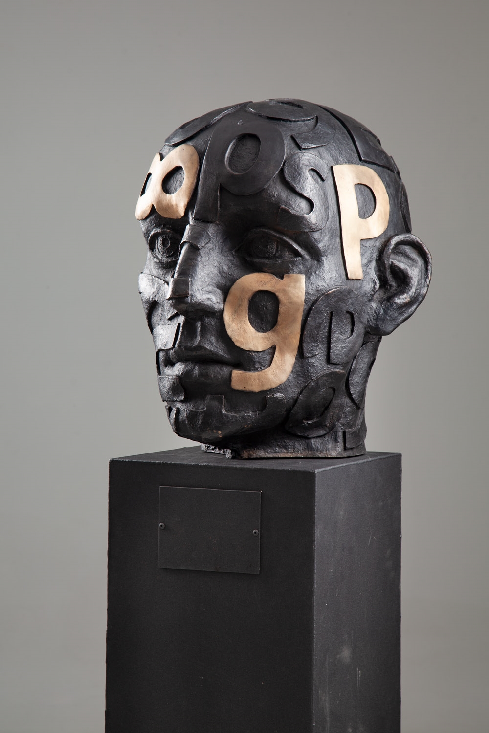 Artwork by Marek Zyga, Big Head, Made of bronze