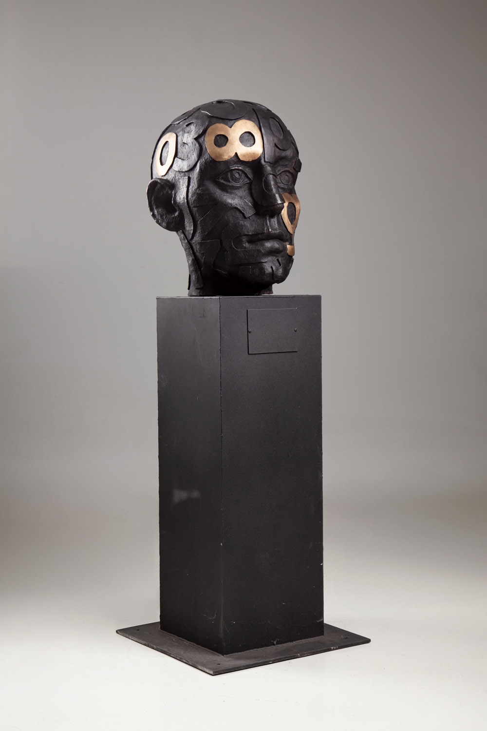 Artwork by Marek Zyga, Big Head, Made of bronze