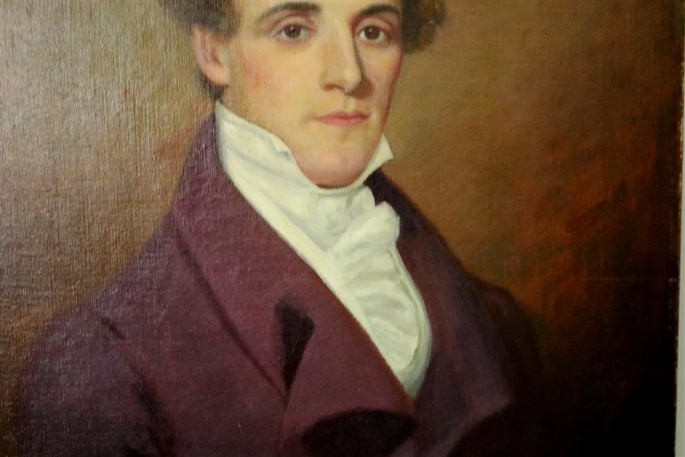 A formal portrait of a person in a maroon coat and white cravat against a warm brown background.