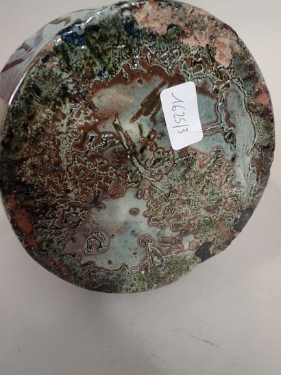 Artwork by Thomas Buxo, Thomas BUXO (XXe siècle). Grand vase en grès à décor émaillé de coulures polychromes et d'un visage féminin, Made of sandstone