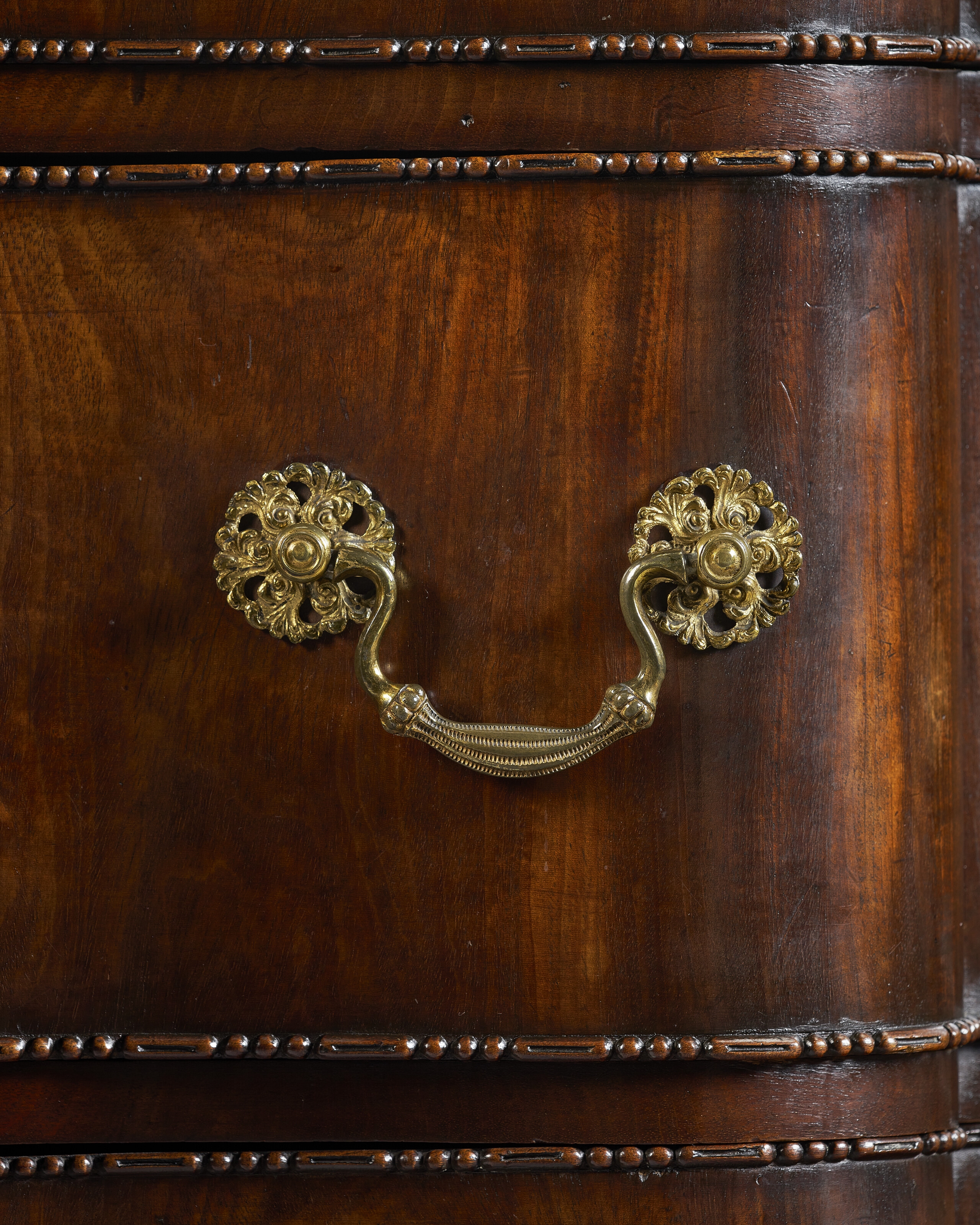 Artwork by Richard Wright, Edward Elwick, A GEORGE III MAHOGANY SERPENTINE COMMODE, Made of engraving
