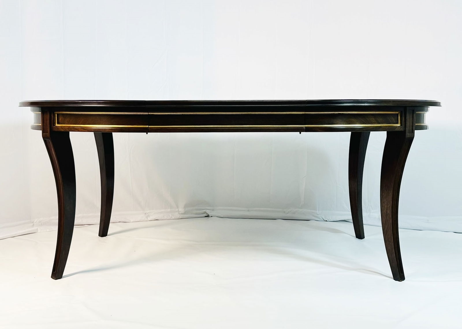 Artwork by Madeline Stuart, Talbot Dining Table, Made of mahogany and walnut wood