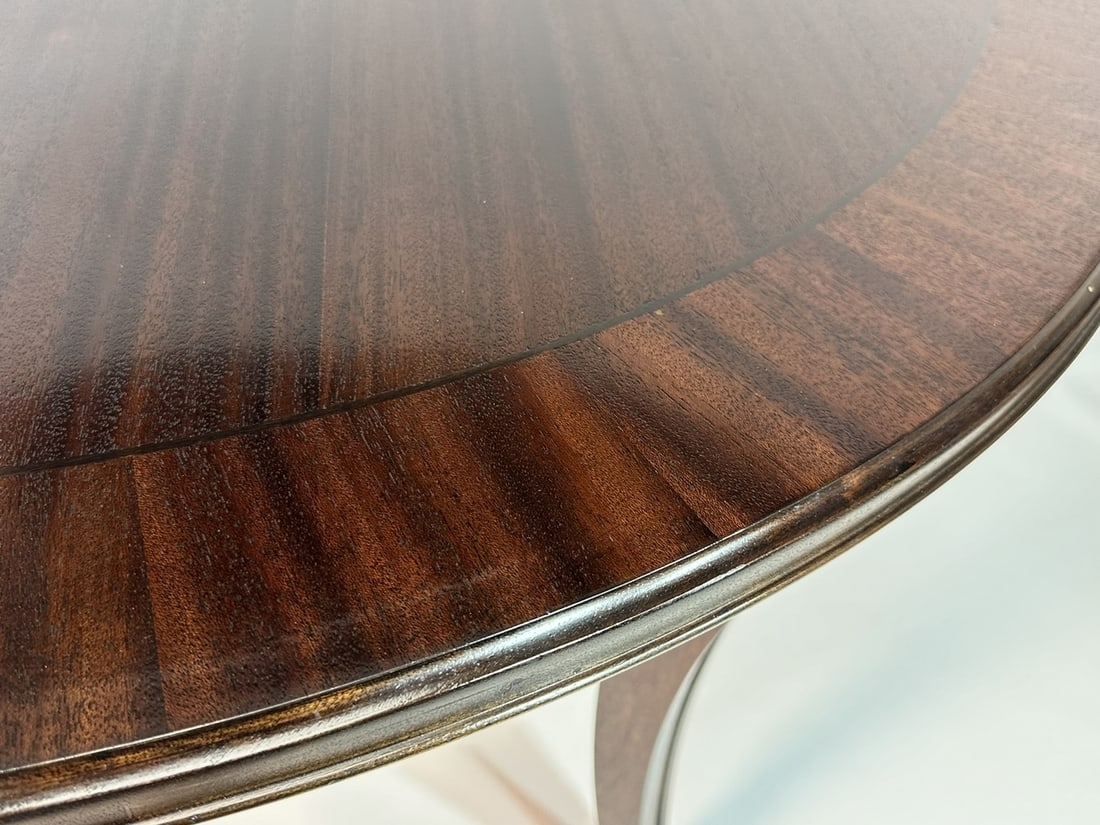 Artwork by Madeline Stuart, Talbot Dining Table, Made of mahogany and walnut wood