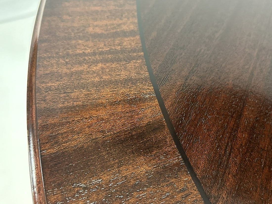 Artwork by Madeline Stuart, Talbot Dining Table, Made of mahogany and walnut wood