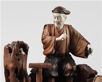 RYUUN: A LARGE TOKYO SCHOOL INLAID WOOD OKIMONO OF A SARUMAWASHI WITH MONKEY - Ryuun