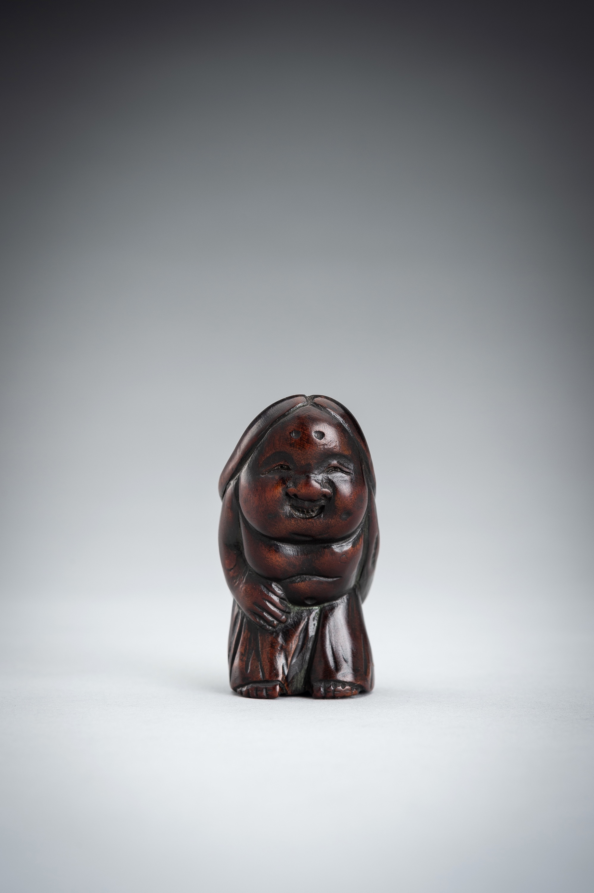 Japanese School, 19th Century | A LARGE WOOD SHUNGA NETSUKE OF OKAME ...