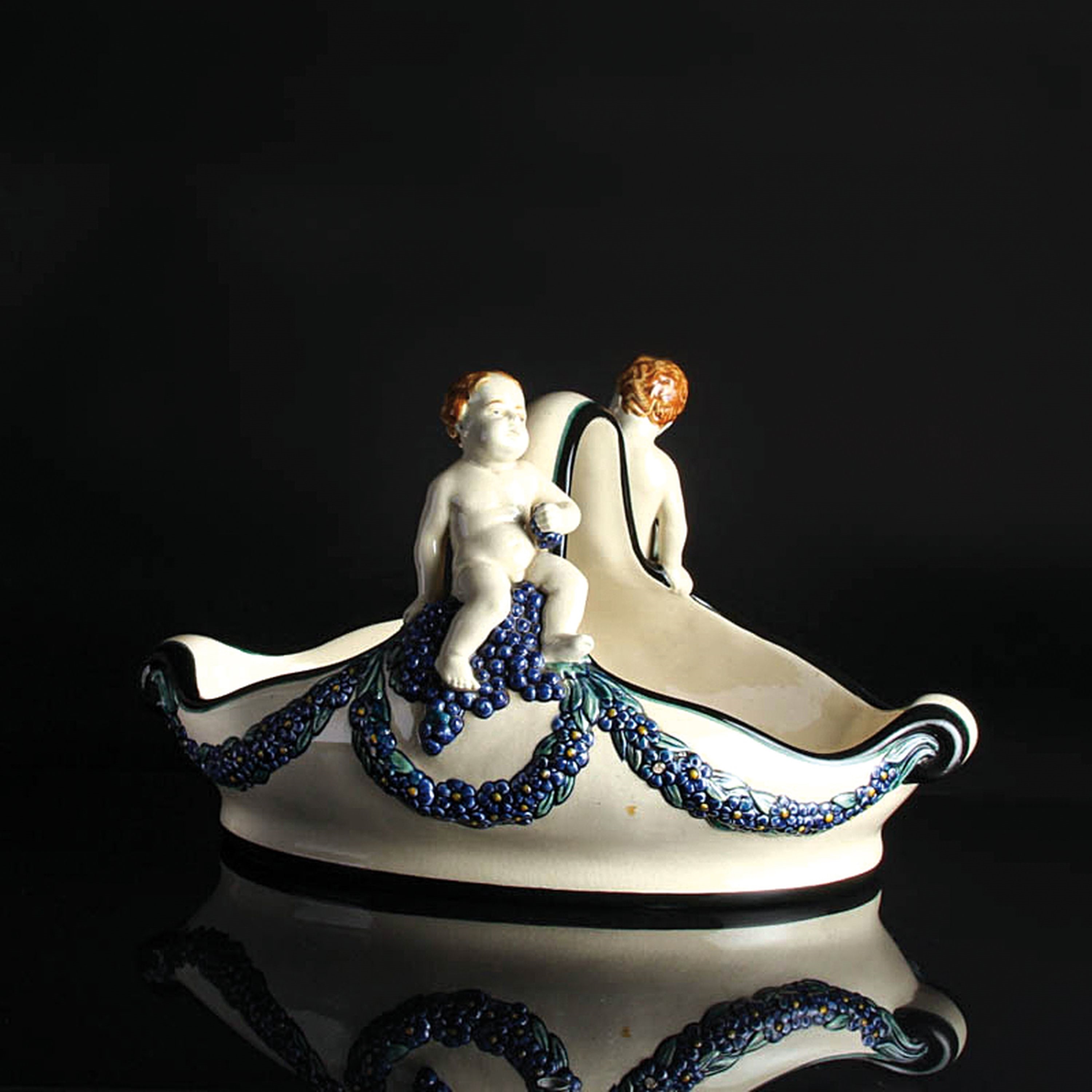 Artwork by Wilhelm Süs, Handle bowl with grape putti, Made of ceramic, color