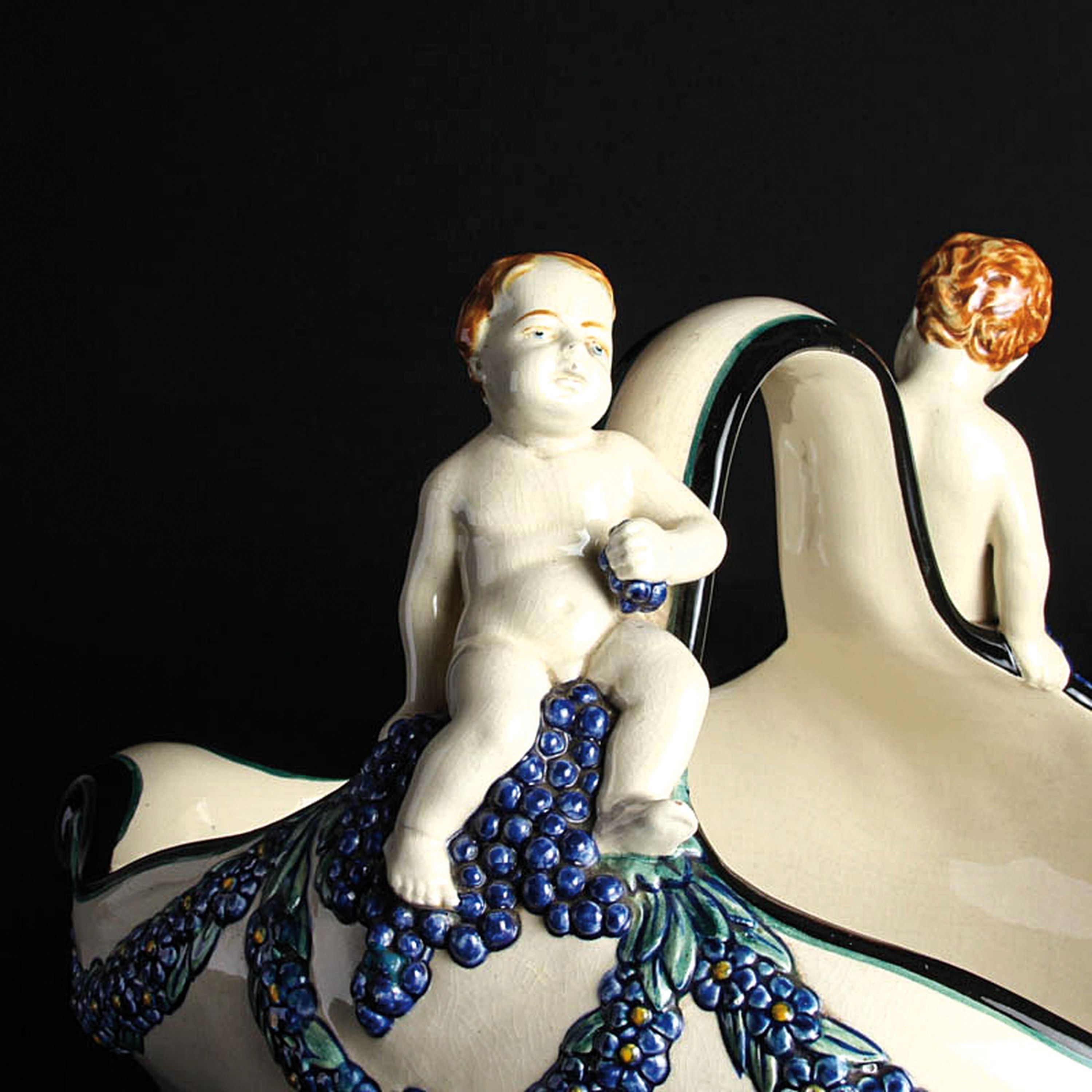 Artwork by Wilhelm Süs, Handle bowl with grape putti, Made of ceramic, color