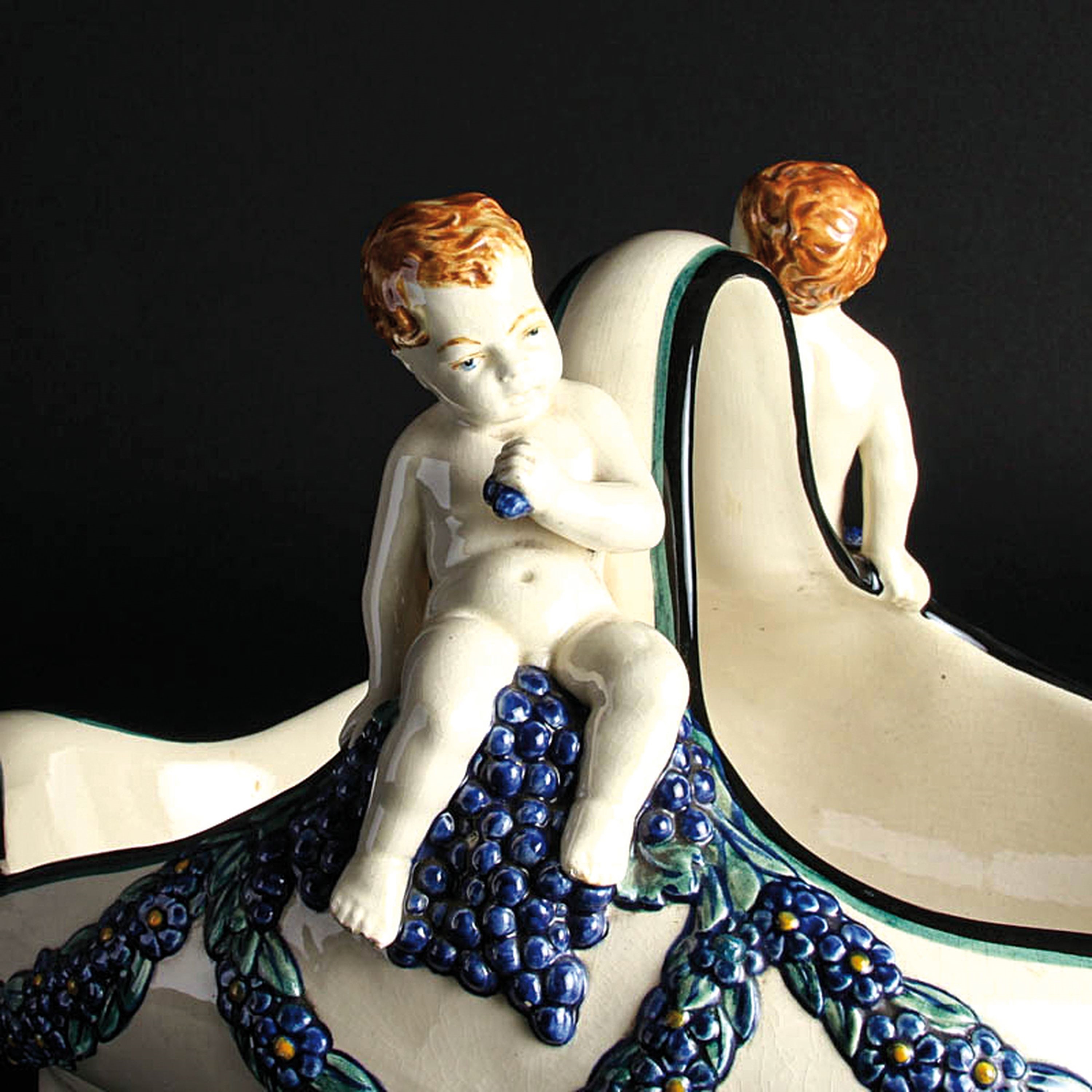 Artwork by Wilhelm Süs, Handle bowl with grape putti, Made of ceramic, color