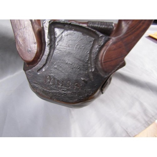 Artwork by Musa, Samburu chief resting, Made of carved wood