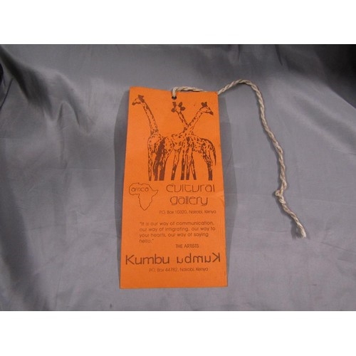 Artwork by Musa, Samburu chief resting, Made of carved wood