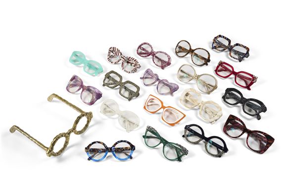 A CASE OF EIGHTEEN MULTICOLOR AND PATTERN EYEGLASS FRAMES