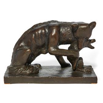 A bronze sculpture of a bear carrying a smaller figure in its mouth.