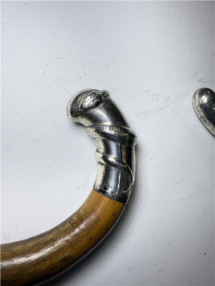 Silver | A 20th Century walking cane with engraved silver loop handle ...