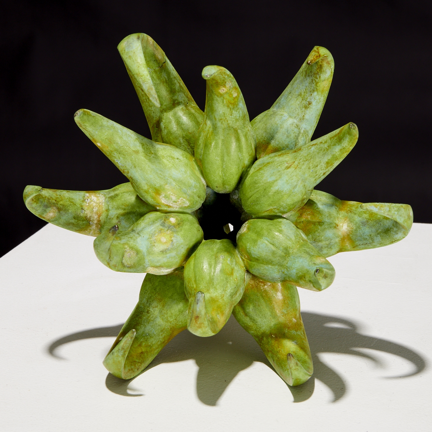 Artwork by Gabo Guzzo, "Extinct In The Wild", Made of bronze sculpture