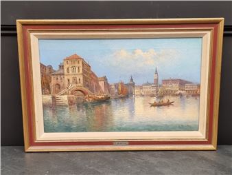 A framed watercolor painting of a canal city scene with gondolas and historic buildings.