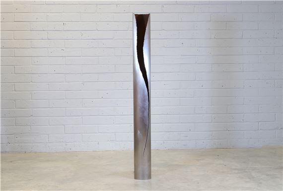 Cut I designed in 2013 a tubular iron floor lamp to the side with an organically shaped cut - Gianluca Pacchioni