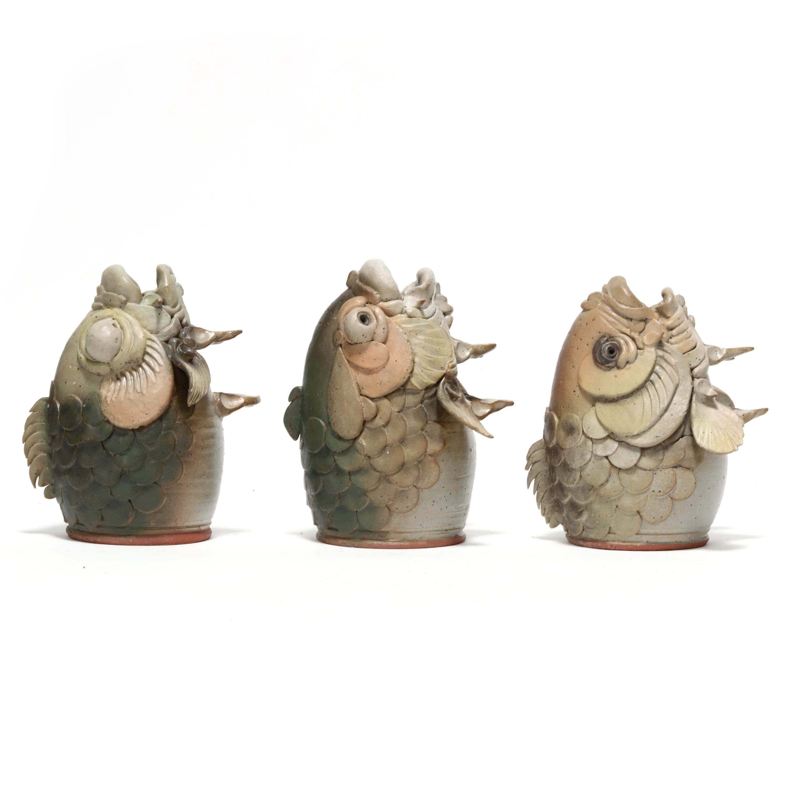 Artwork by Douglas Fey, Six Whimsical Fish Head Pottery Bird "Garglers", Made of glazed red earthenware clay