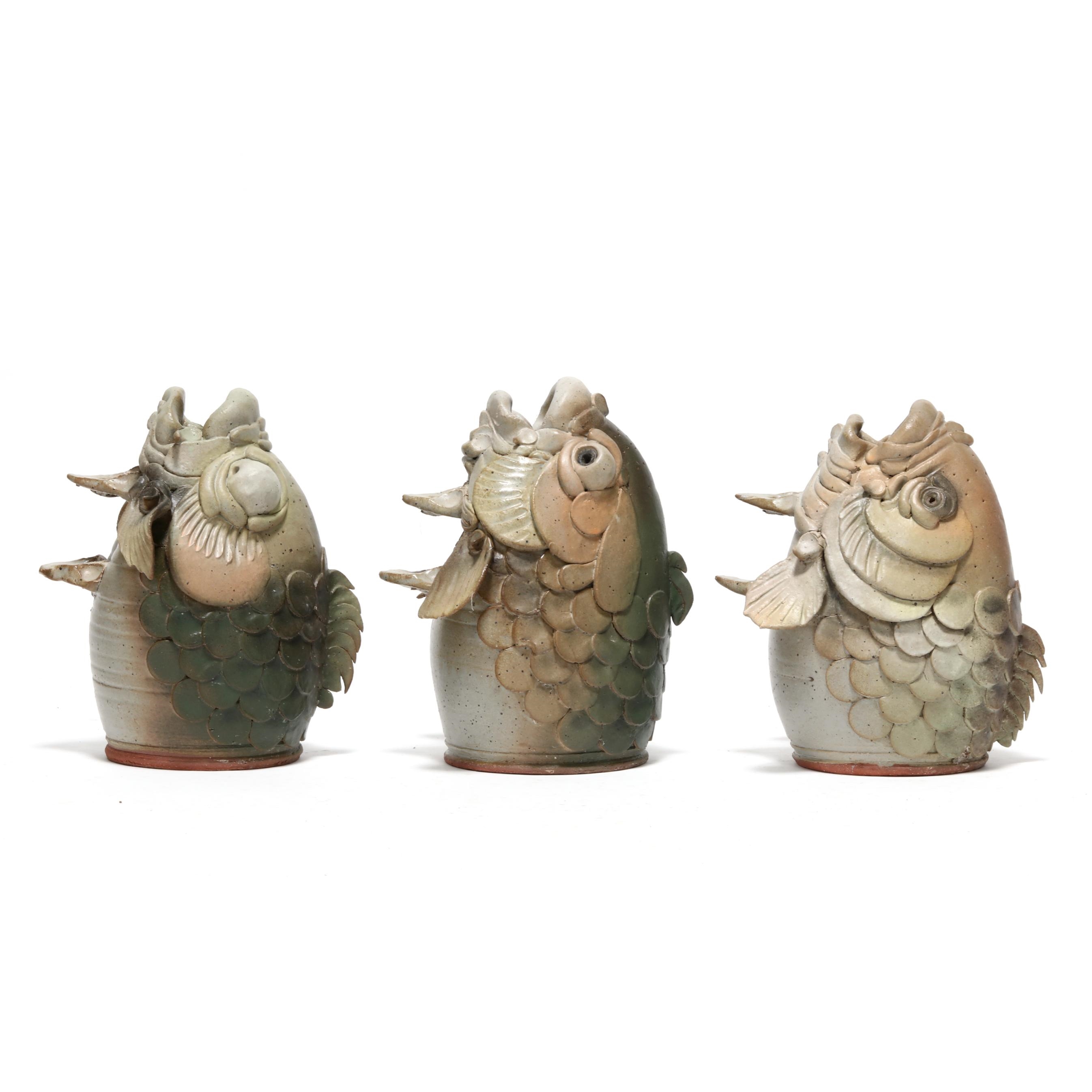 Artwork by Douglas Fey, Six Whimsical Fish Head Pottery Bird "Garglers", Made of glazed red earthenware clay