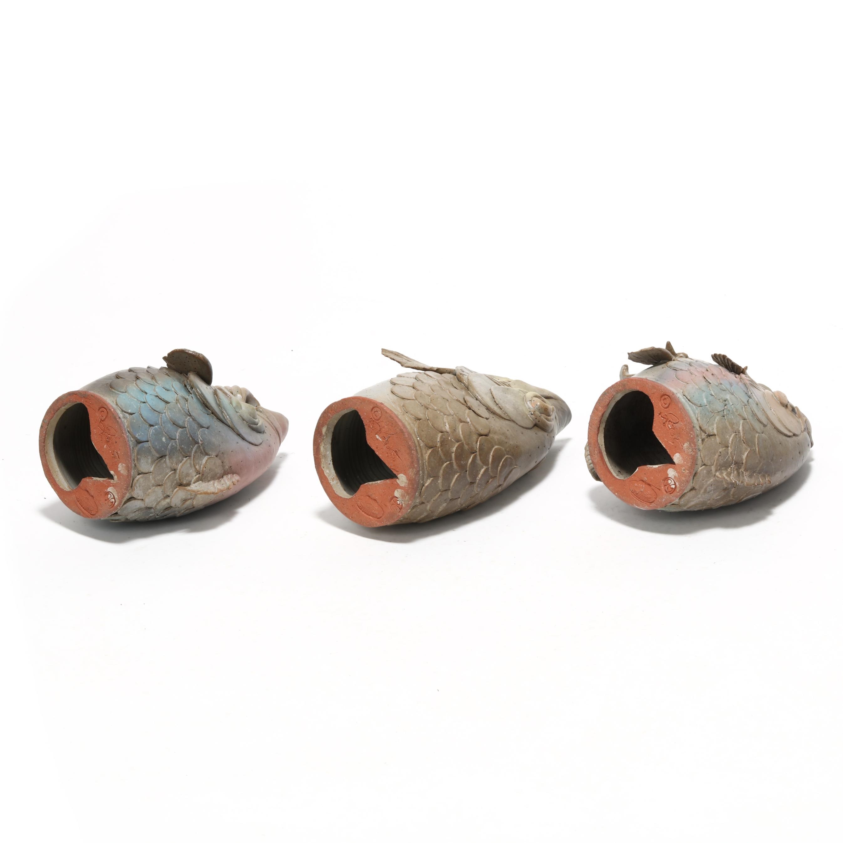 Artwork by Douglas Fey, Six Whimsical Fish Head Pottery Bird "Garglers", Made of glazed red earthenware clay