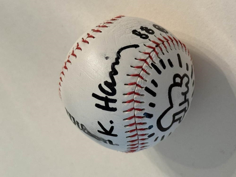 Artwork by Keith Haring, Drawing on a baseball, Made of Black marker drawing