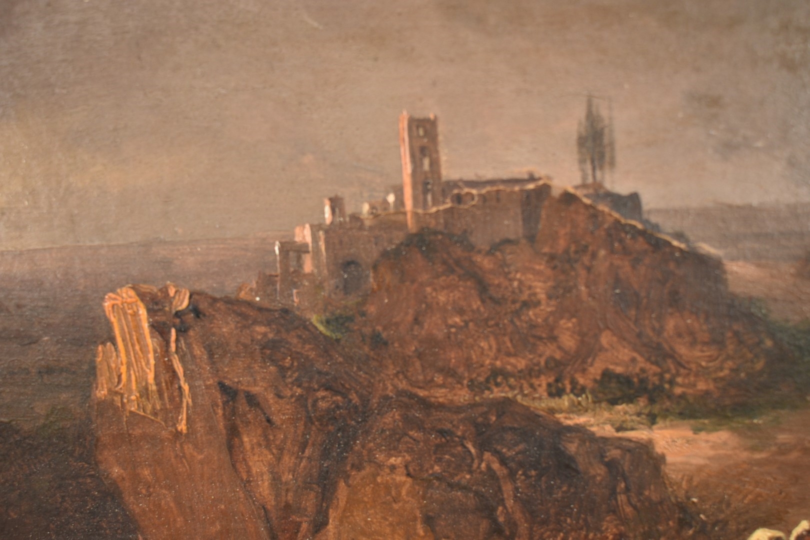 David Roberts | An extensive mountainous landscape with figures by a ...