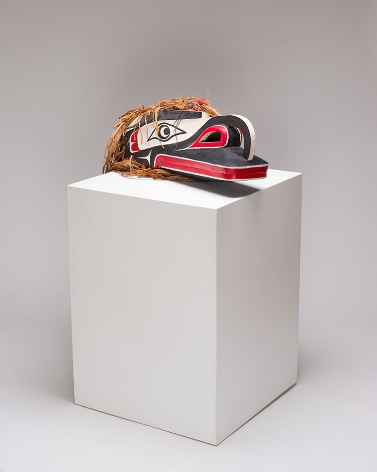 Artwork by Beau Dick, Crooked Beak Mask, Made of carved cedar, cedar bark, acrylic