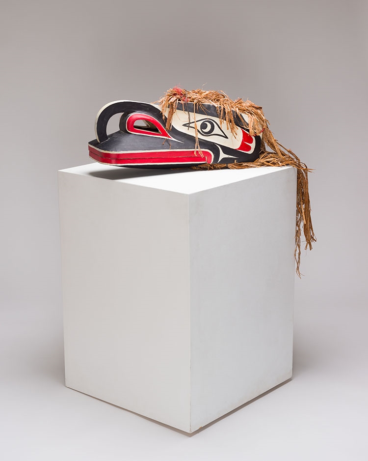 Artwork by Beau Dick, Crooked Beak Mask, Made of carved cedar, cedar bark, acrylic