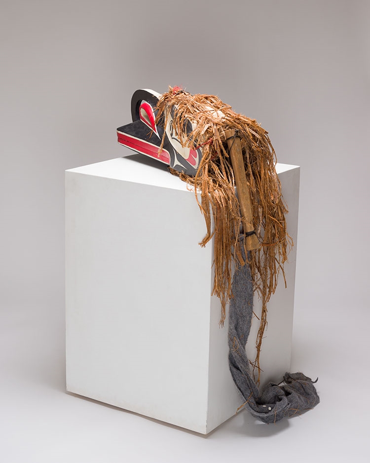 Artwork by Beau Dick, Crooked Beak Mask, Made of carved cedar, cedar bark, acrylic