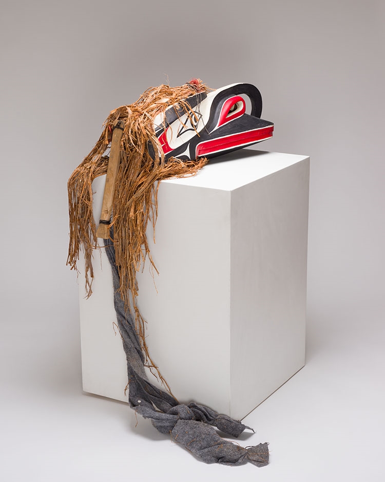 Artwork by Beau Dick, Crooked Beak Mask, Made of carved cedar, cedar bark, acrylic