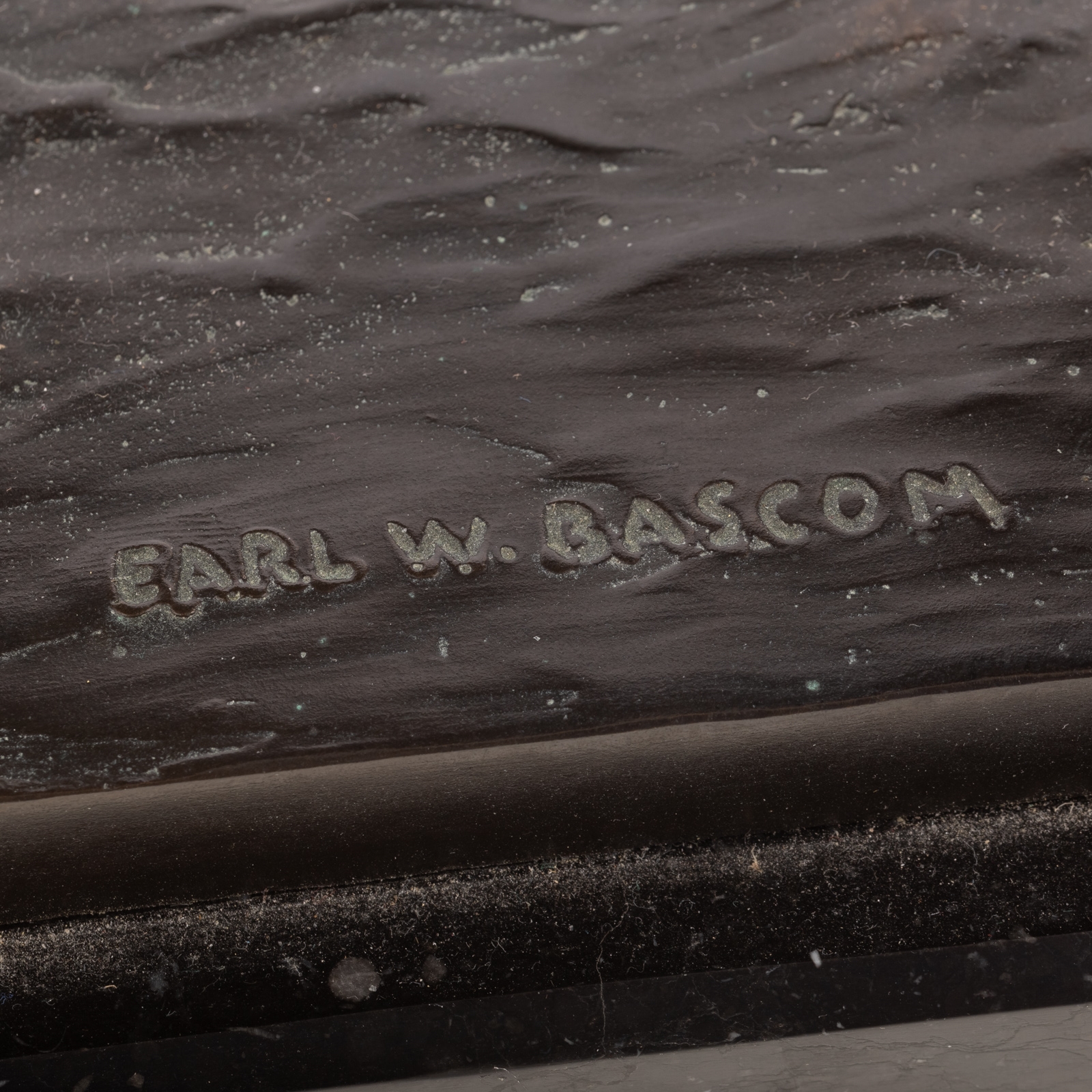 Artwork by Earl Wesley Bascom, Poco Bueno, Made of bronze