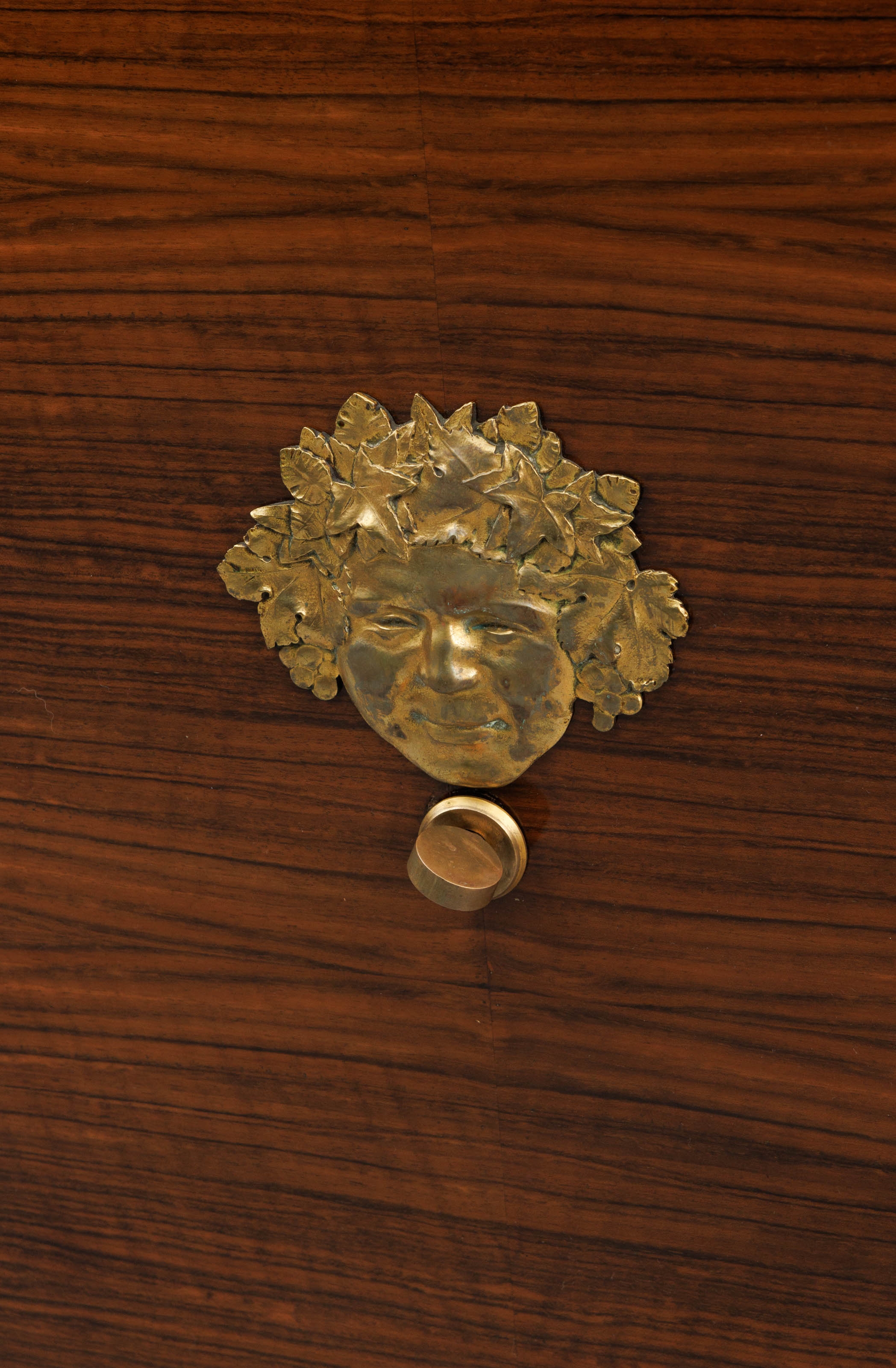Artwork by Jules Leleu, A polished rosewood art deco-period sideboard, Made of polished rosewood