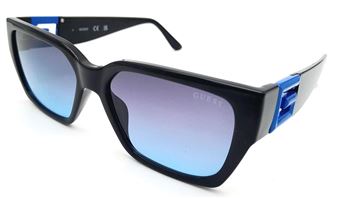 A Pair of Designer Guess Sunglasses - Voitre Marek