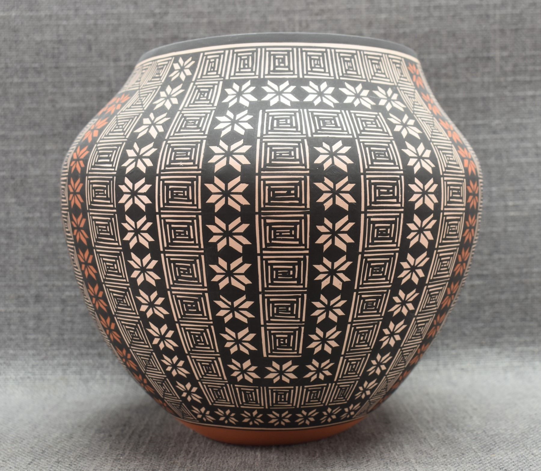 Artwork by Terrance Chino Sr, ACOMA OLLA, Made of pottery, hand coiled with polychrome painted fine line and geometric designs