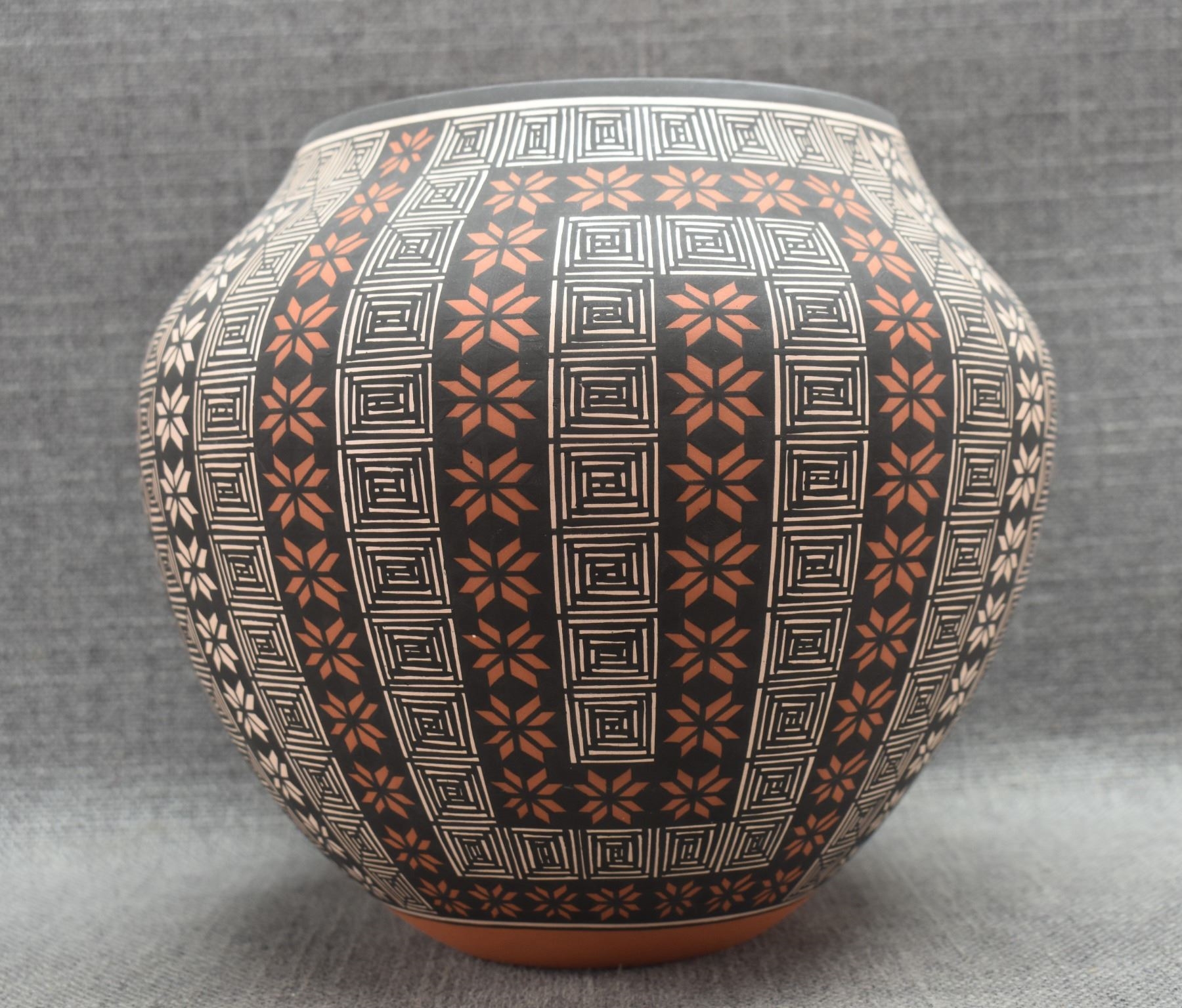 Artwork by Terrance Chino Sr, ACOMA OLLA, Made of pottery, hand coiled with polychrome painted fine line and geometric designs