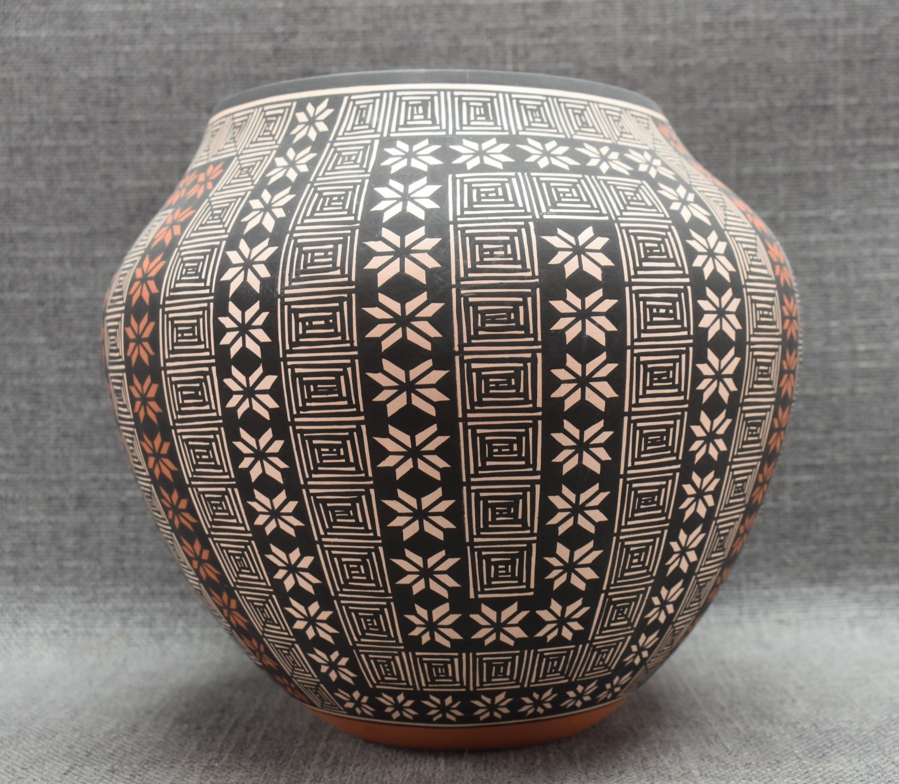 Artwork by Terrance Chino Sr, ACOMA OLLA, Made of pottery, hand coiled with polychrome painted fine line and geometric designs