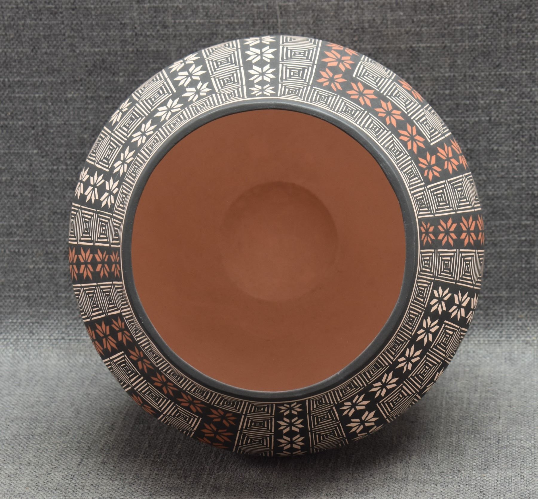 Artwork by Terrance Chino Sr, ACOMA OLLA, Made of pottery, hand coiled with polychrome painted fine line and geometric designs