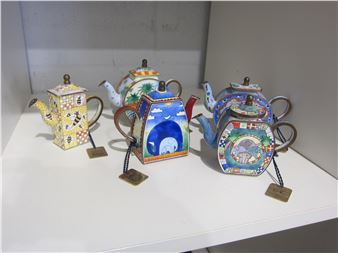 Five Charlotte di Vita  teapots with tags; elephants, tiger - Charlotte di Vita