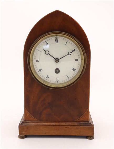 Paris | A mahogany cased lancet shaped mantle clock with white ename ...