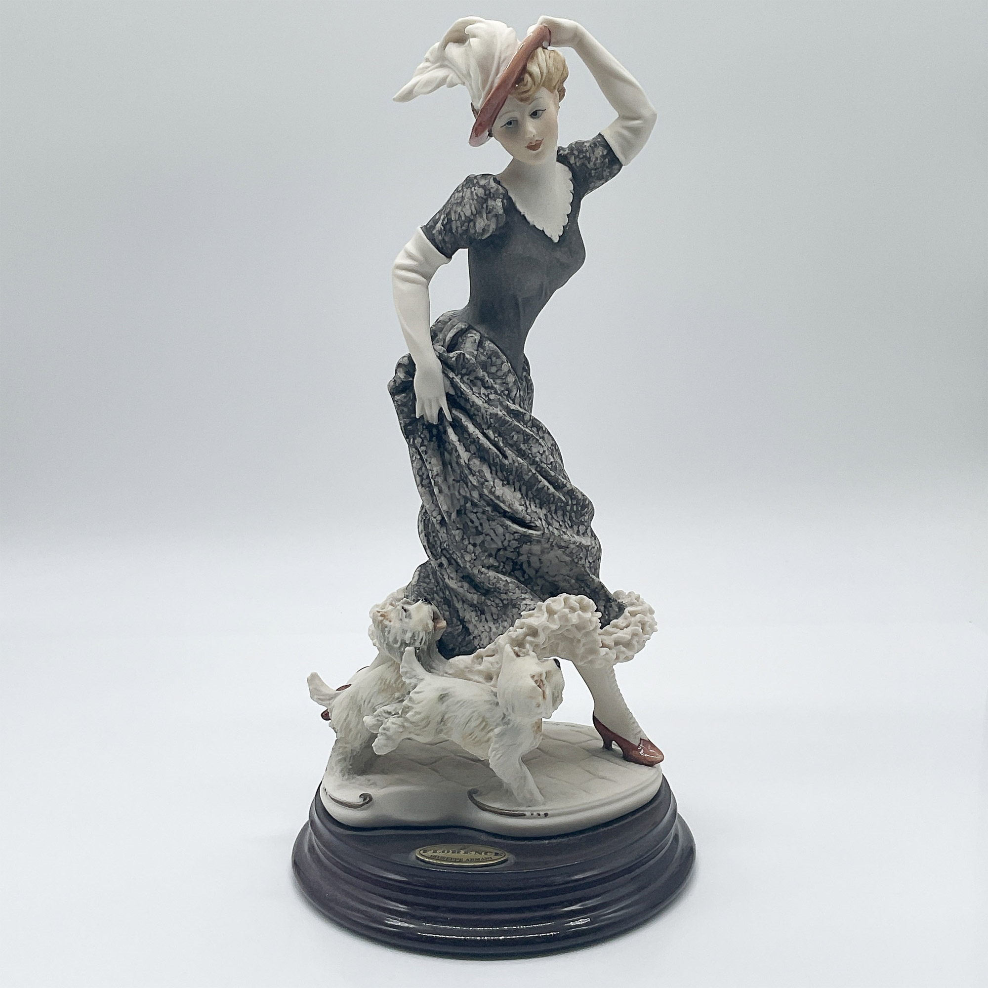 Artwork by Giuseppe Armani, Lady with Dogs, Made of porcelain figurine