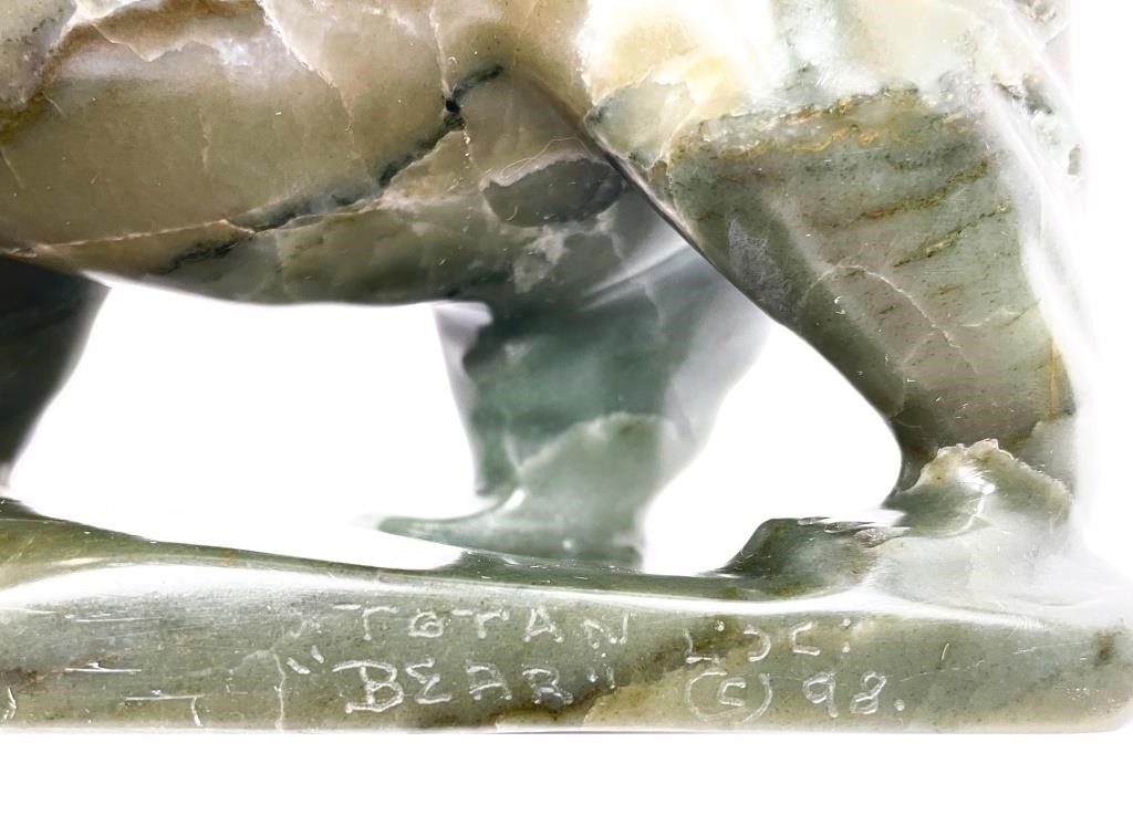 Artwork by Mark Totan, (1953 - 2022) E71103 Igloolik
Bear
soapstone
6.25 x 9.5 x 7.5 in 15.9 x 24.1 x 19 cm 1998
signed, Made of soapstone