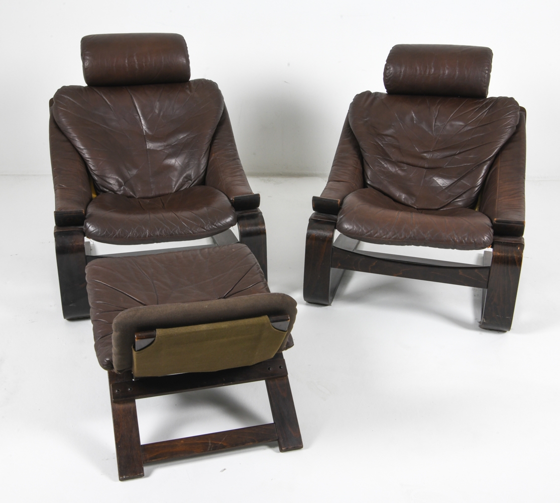 Artwork by Ake Fribyter, PAIR OF AKE FRIBYTTER LEATHER CHAIRS W/ OTTOMAN, Made of bentwood frames with leather upholstery
