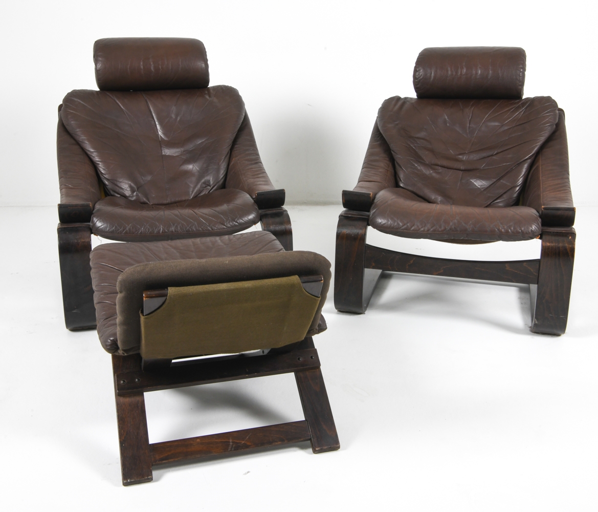 Artwork by Ake Fribyter, PAIR OF AKE FRIBYTTER LEATHER CHAIRS W/ OTTOMAN, Made of bentwood frames with leather upholstery