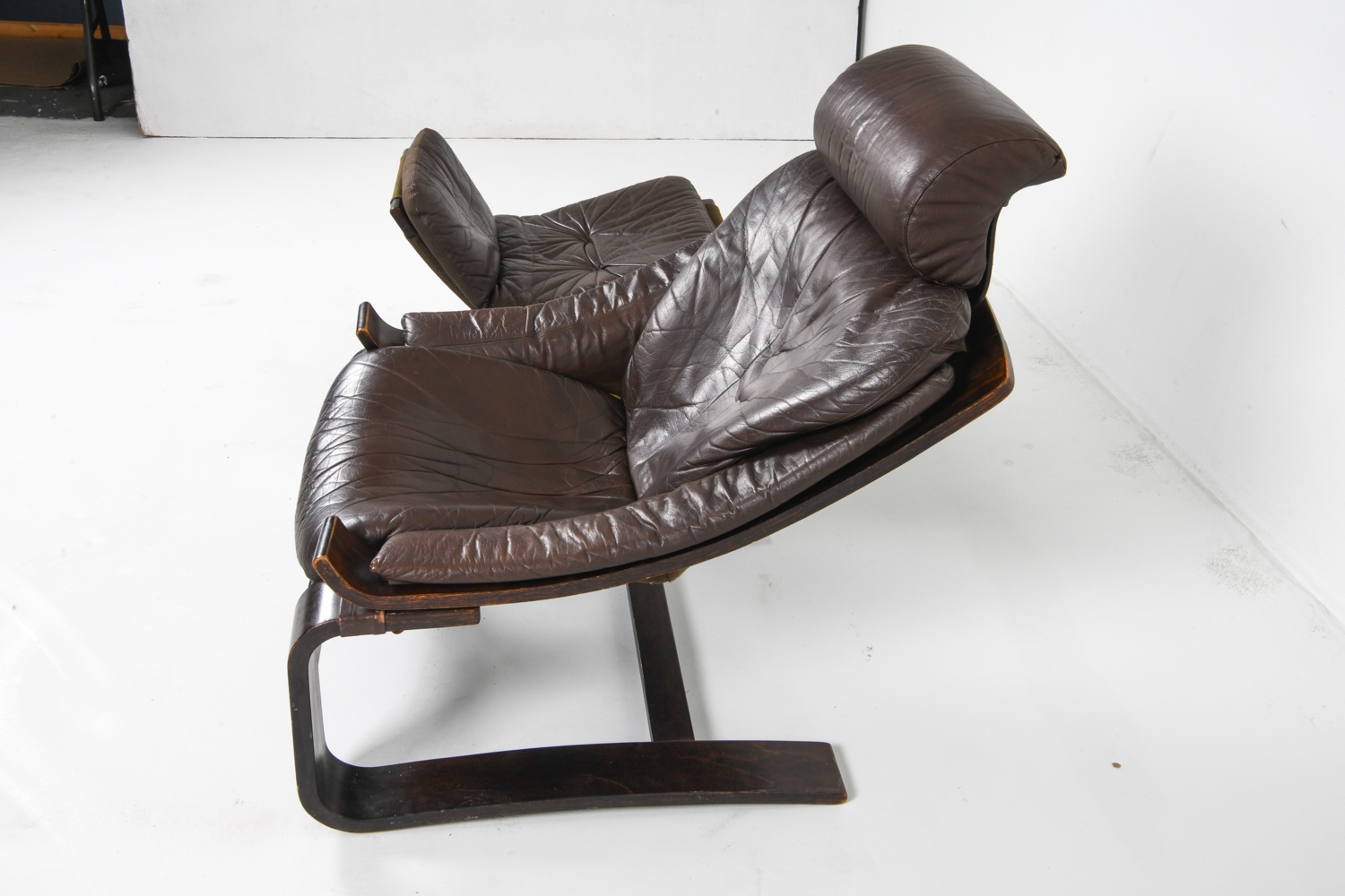 Artwork by Ake Fribyter, PAIR OF AKE FRIBYTTER LEATHER CHAIRS W/ OTTOMAN, Made of bentwood frames with leather upholstery