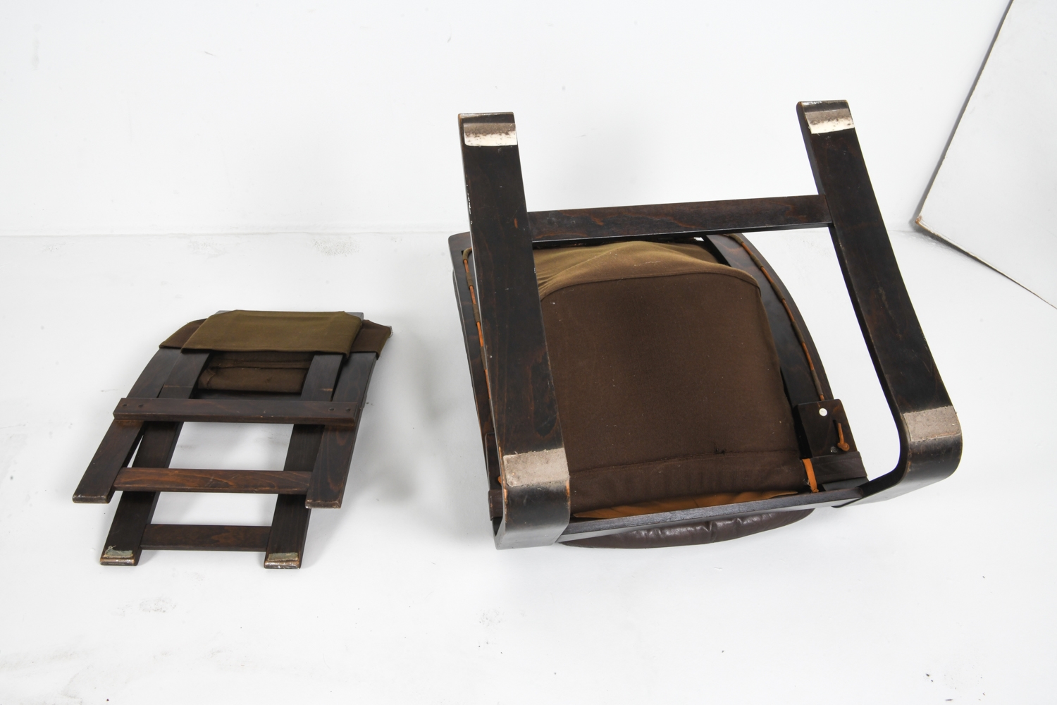 Artwork by Ake Fribyter, PAIR OF AKE FRIBYTTER LEATHER CHAIRS W/ OTTOMAN, Made of bentwood frames with leather upholstery