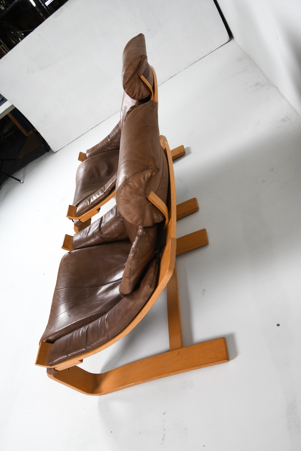 Artwork by Ake Fribyter, PAIR OF AKE FRIBYTTER BEACH LOUNGE CHAIRS, Made of Bentwood beech frames with tan leather upholstery