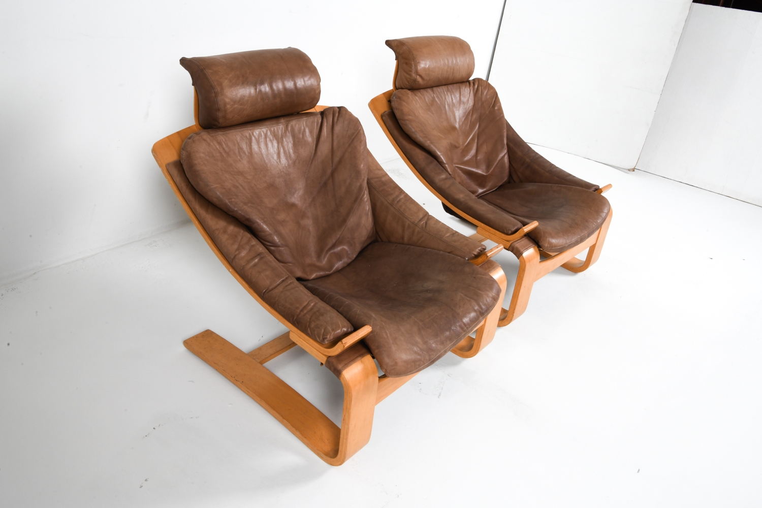 Artwork by Ake Fribyter, PAIR OF AKE FRIBYTTER BEACH LOUNGE CHAIRS, Made of Bentwood beech frames with tan leather upholstery