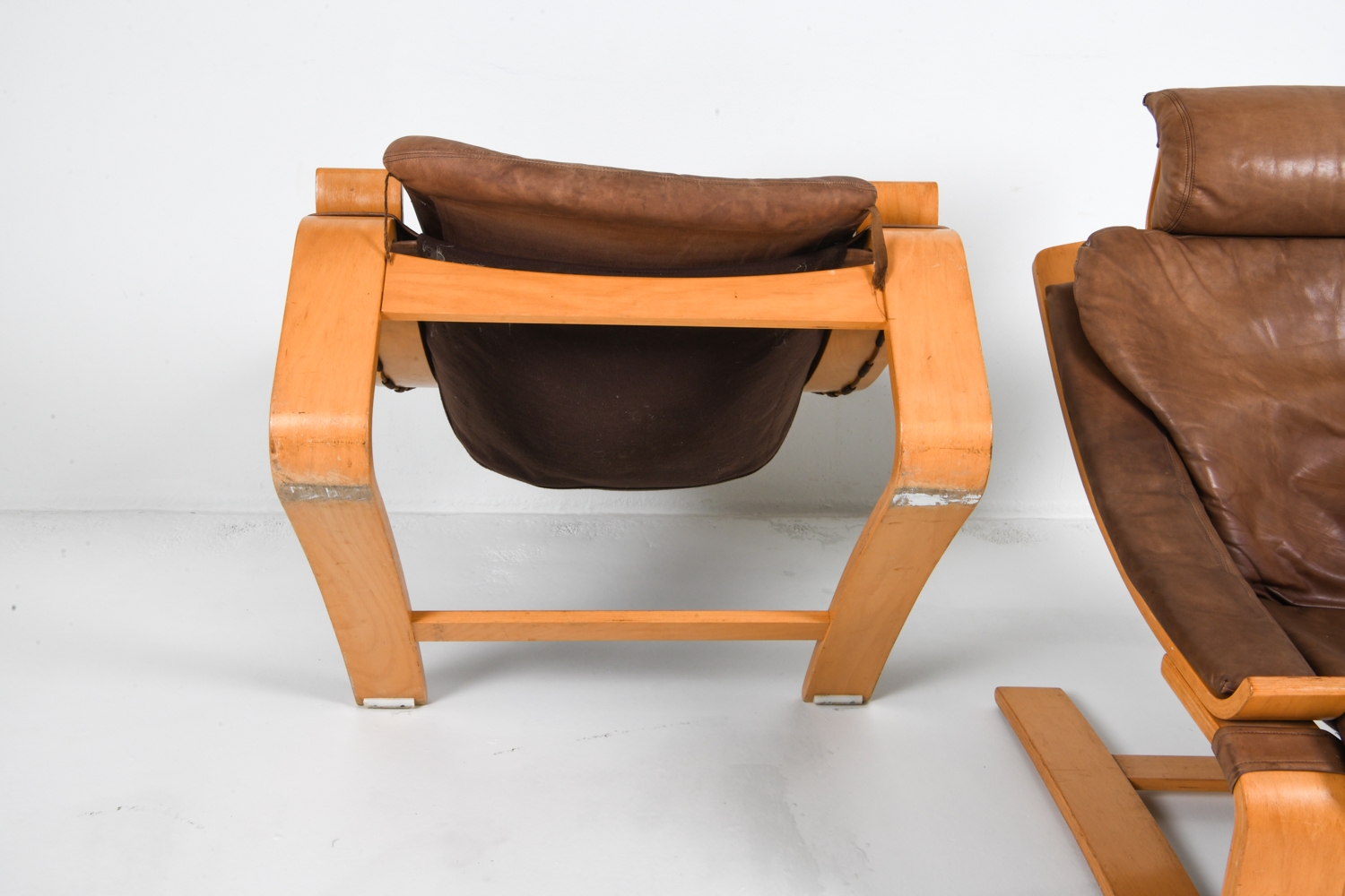Artwork by Ake Fribyter, PAIR OF AKE FRIBYTTER BEACH LOUNGE CHAIRS, Made of Bentwood beech frames with tan leather upholstery